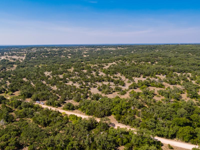 Dense trees cover the Quihi Draw Ranch