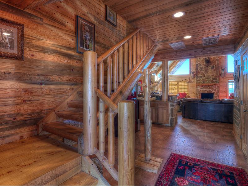 The M&M Wildlife main home has Ponderosa Pine cabinets and railing.