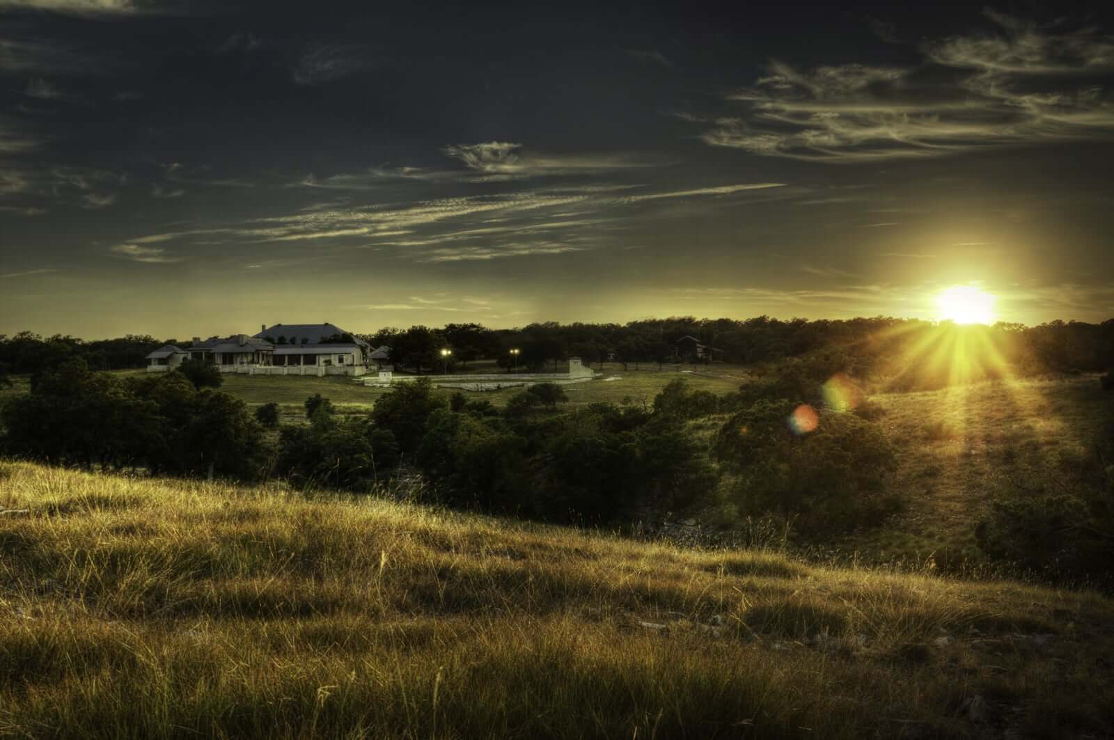 Ranch house at sunset for marketing purposes.